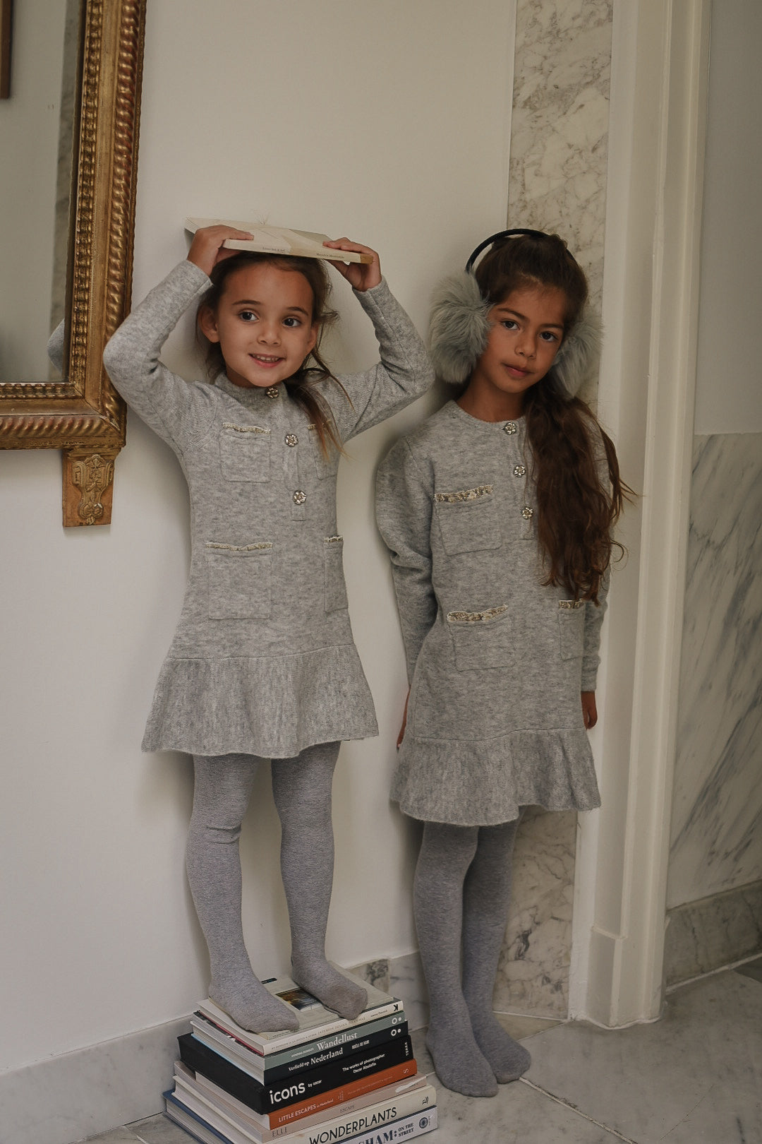 Two girls wearing the Charlie Knit Dress in Dove in the Canal House