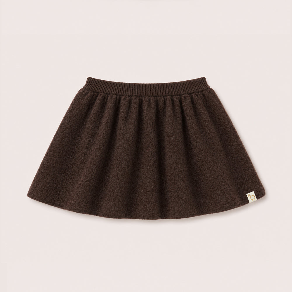 Charlie Knit Skirt in Chocolate on a neutral background