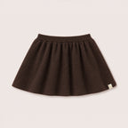 Charlie Knit Skirt in Chocolate on a neutral background