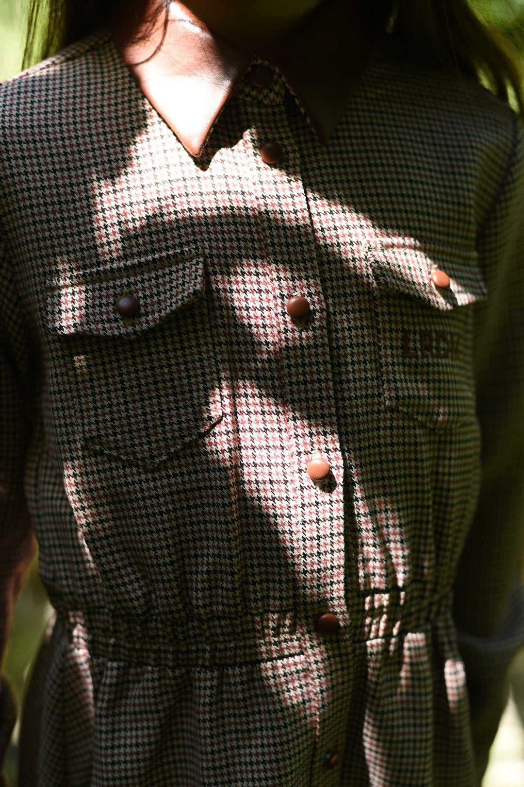 Close-up of the Isabella Dress details in the woodland