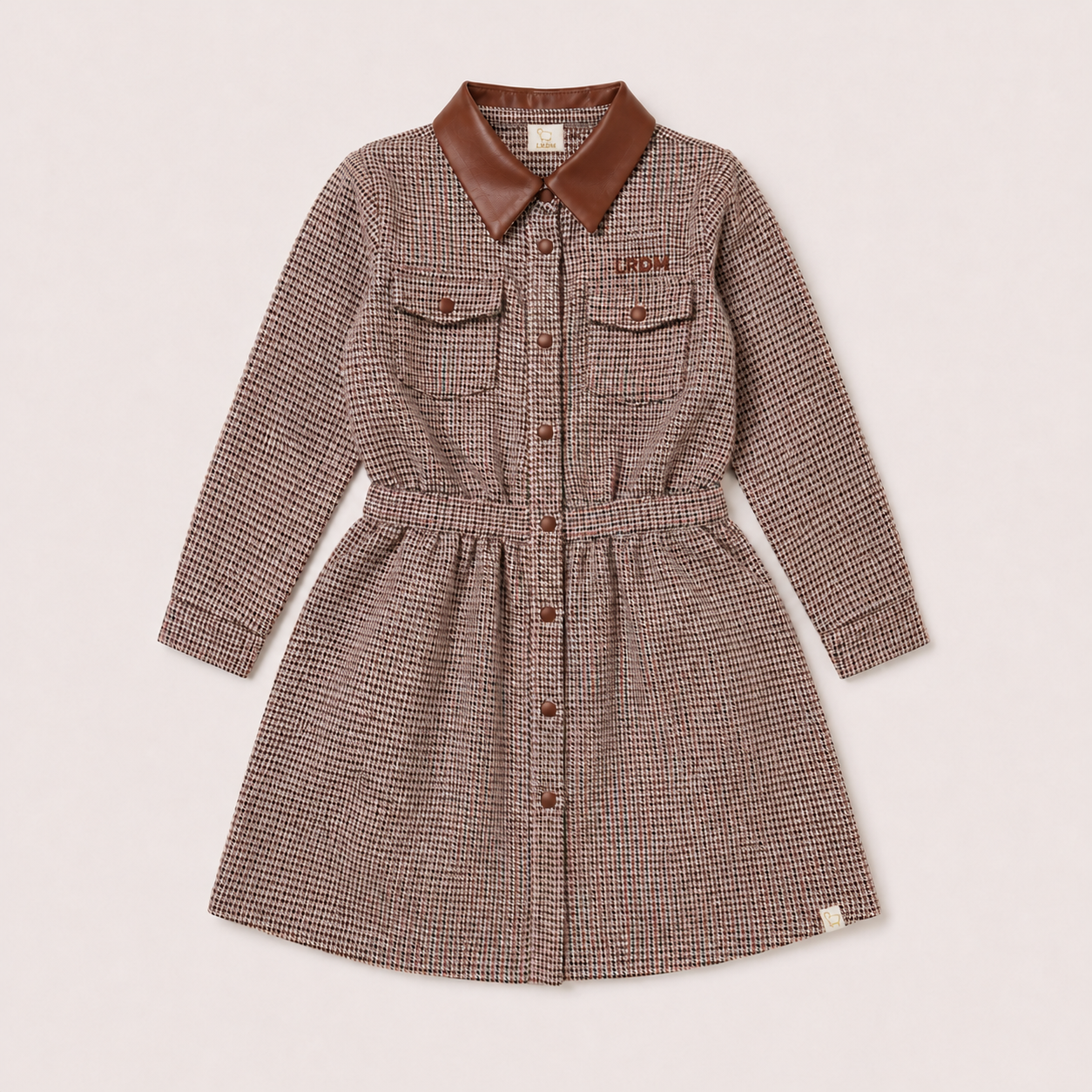 Isabella Dress in houndstooth with brown LRDM embroidery on a neutral background