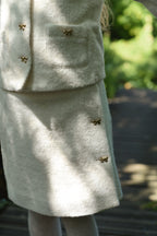 Close-up of the Mara Tweed Skirt details in the woodland