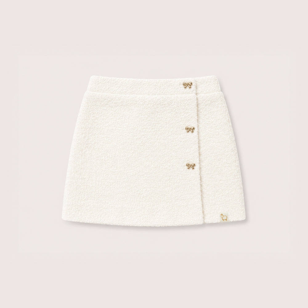 Mara Tweed Skirt on a neutral background