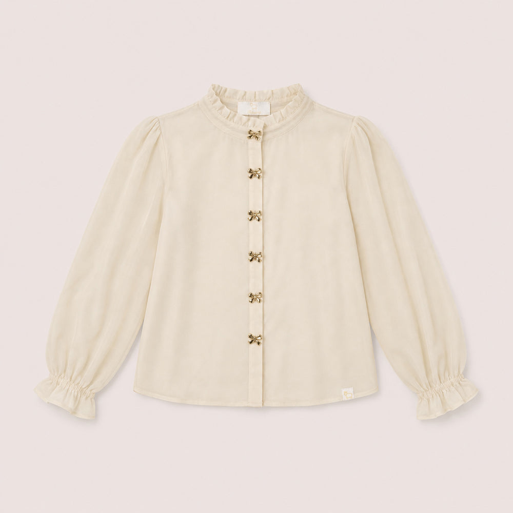 Zara Blouse in Sand on a neutral background
