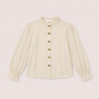Zara Blouse in Sand on a neutral background