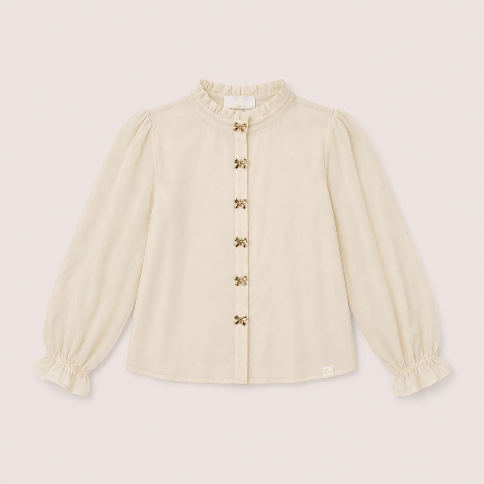 Zara Blouse in Sand on a neutral background