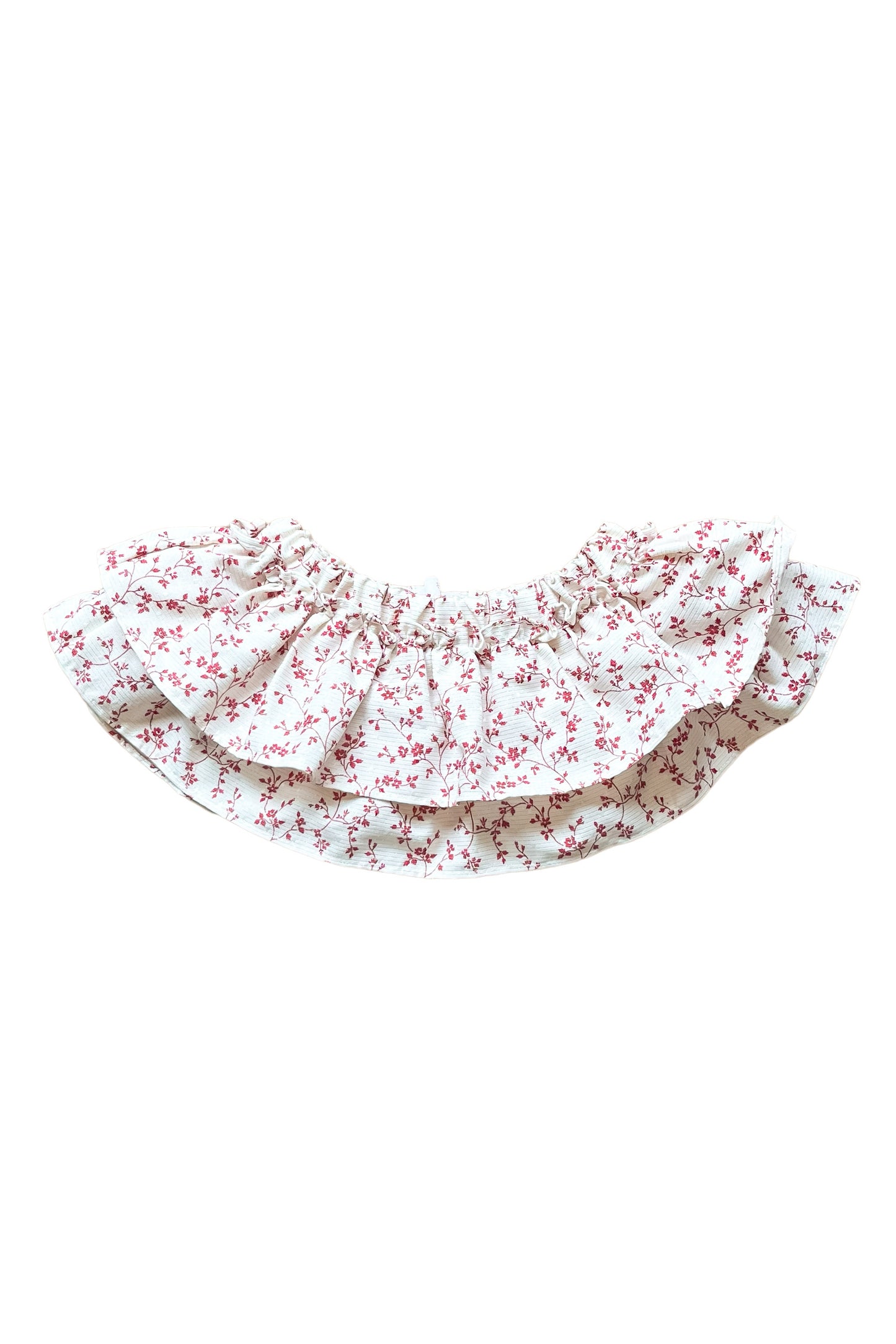 This beautiful bloomer with two layers of ruffles is timeless. The fabric is specially woven in Paris for LRDM petits. The bloomer is made of recycled cotton. The perfect floral print and subtle lurex details make the fabric luxurious and elegant. The bloomer can be perfectly combined with the Elise blouse and Celine blouse.